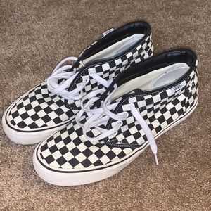 Vans Checkerboard Mids.